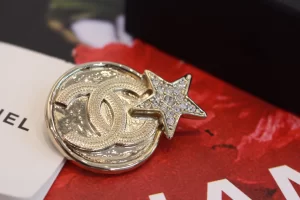 Chanel Gold CC Round Star Brooch