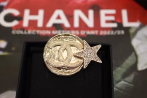 Chanel Gold CC Round Star Brooch