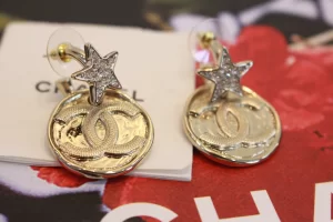 Chanel Gold CC Round Star Earrings