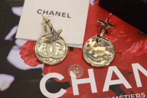 Chanel Gold CC Round Star Earrings