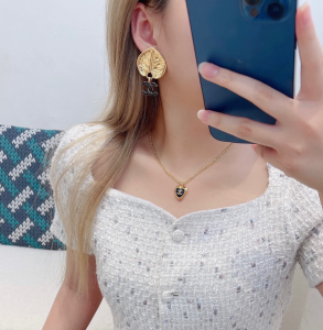 Chanel CC Logo Gold Leaf Earrings
