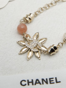 Chanel Gold Metal Flower Bracelets