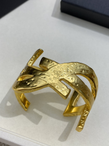 Saint Laurent Gold Metal Cassandre Cuff Bracelets Saint Laurent Gold Metal Cassandre Cuff Bracelets