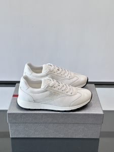 Prada White Leather and Mesh Low Top Sneakers Prada White Leather and Mesh Low Top Sneakers