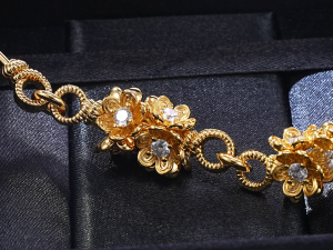 Miu Miu Gold Metal Bracelets