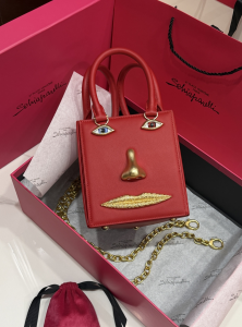 Schiaparelli Anatomy Jewelery Triple Red Leather Face Bag Schiaparelli Anatomy Jewelery Triple Red Leather Face Bag