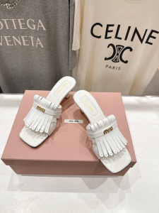 Miu Miu Logo White Leather Fringed Heeled Slides Sandals 50MM Miu Miu Logo White Leather Fringed Heeled Slides Sandals 50MM