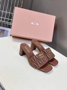 Miu Miu Logo Matelasse Nappa Leather Heeled Slides Sandals Shoes Brown Miu Miu Logo Matelasse Nappa Leather Heeled Slides Sandals Shoes Brown