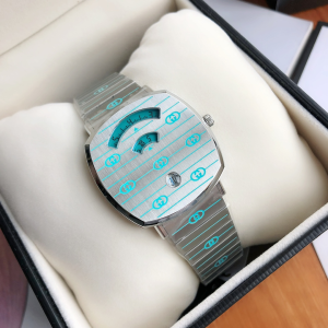 Gucci Grip Mens Quartz Movement Watch Steel Case and Bracelet GG Engraved and Blue Super LumiNova Enamel 38MM Gucci Grip Mens Quartz Movement Watch Steel Case and Bracelet GG Engraved and Blue Super LumiNova Enamel 38MM