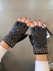 Chanel Black Lambskin Fingerless Chain CC Gloves Chanel Black Lambskin Fingerless Chain CC Gloves