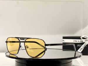 Prada Essenceofluxury Sunglasses VPR58YS Yellow 
