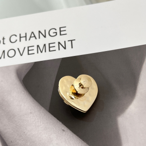 Replica Womens Jewelry Chanel Gold Lock Heart Brooch A62PP180 AA193365