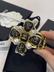 Chanel CC Cross Bangle Bracelet Black