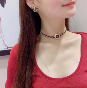 Chanel CC Bowknot Leather Earrings