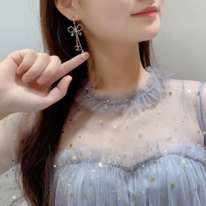 Chanel CC Bowknot Leather Earrings