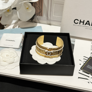 Chanel White CC Gold Cuff Bracelets