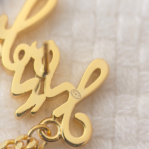 Chanel Monogram Logo Gold Earrings