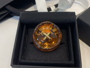 Chanel Orange Button Brooch