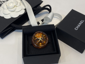 Chanel Orange Button Brooch