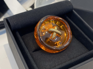Chanel Orange Button Brooch