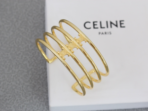 Celine Triomphe Cage Cuff Gold Bracelets