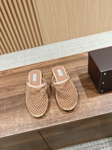 Alaia Beige Fishnet Flat Mules