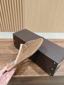 Alaia Beige Fishnet Flat Mules