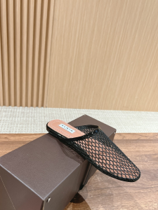 Alaia Black Fishnet Flat Mules