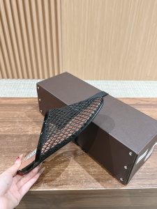 Alaia Black Fishnet Flat Mules