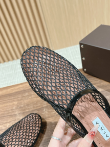 Alaia Black Fishnet Flat Mules