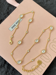 Miu Miu Metal Bracelets with Crystals