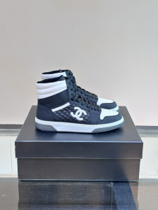 Chanel CC Logo Suede and Calfskin Lace Up Sneakers Boot Black White Chanel CC Logo Suede and Calfskin Lace Up Sneakers Boot Black White