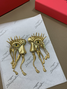 Schiaparelli Face Pendant Earrings Gold