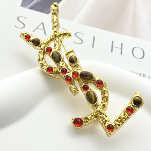 Saint Laurent YSL Cassandre Tigers Eye Sunstone and Metal Brooch Saint Laurent YSL Cassandre Tigers Eye Sunstone and Metal Brooch