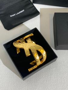 Saint Laurent Gold Metal YSL Cassandra Bracelets Saint Laurent Gold Metal YSL Cassandra Bracelets